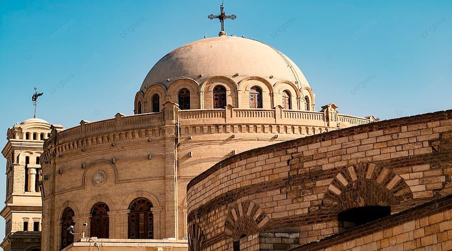 Exterior view of the Hanging Church in Cairo with its elevated structure and bell towers